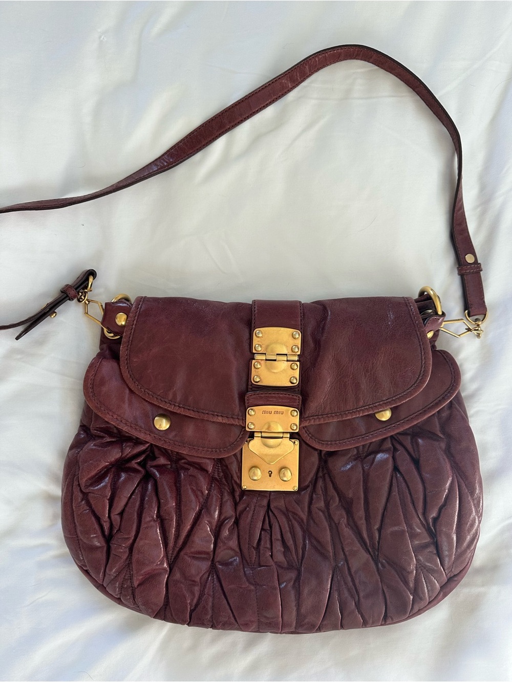 Miu Miu Burgundy Shoulder Bag with Gold Clasp and Ruched Detailing